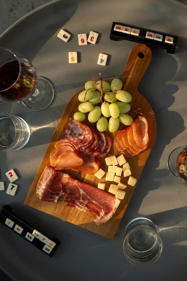 Charcuterie, wine and dominoes on the rooftop